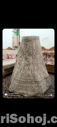 বিলাসবহুল ব্রাইডাল লেহেঙ্গা — জরি ও স্টোন কাজ সহ নতুন